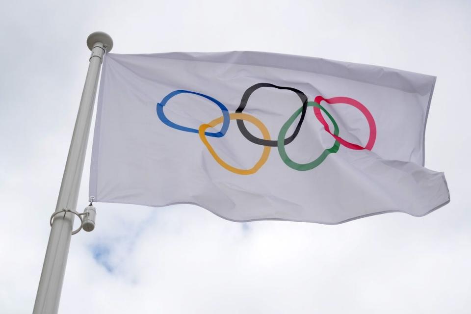 Jul 23, 2024, Saint-Denis, France; The Olympic rings flag at the 2024 Paris Olympics athlete village. Mandatory Credit: Kirby Lee-USA TODAY Sports