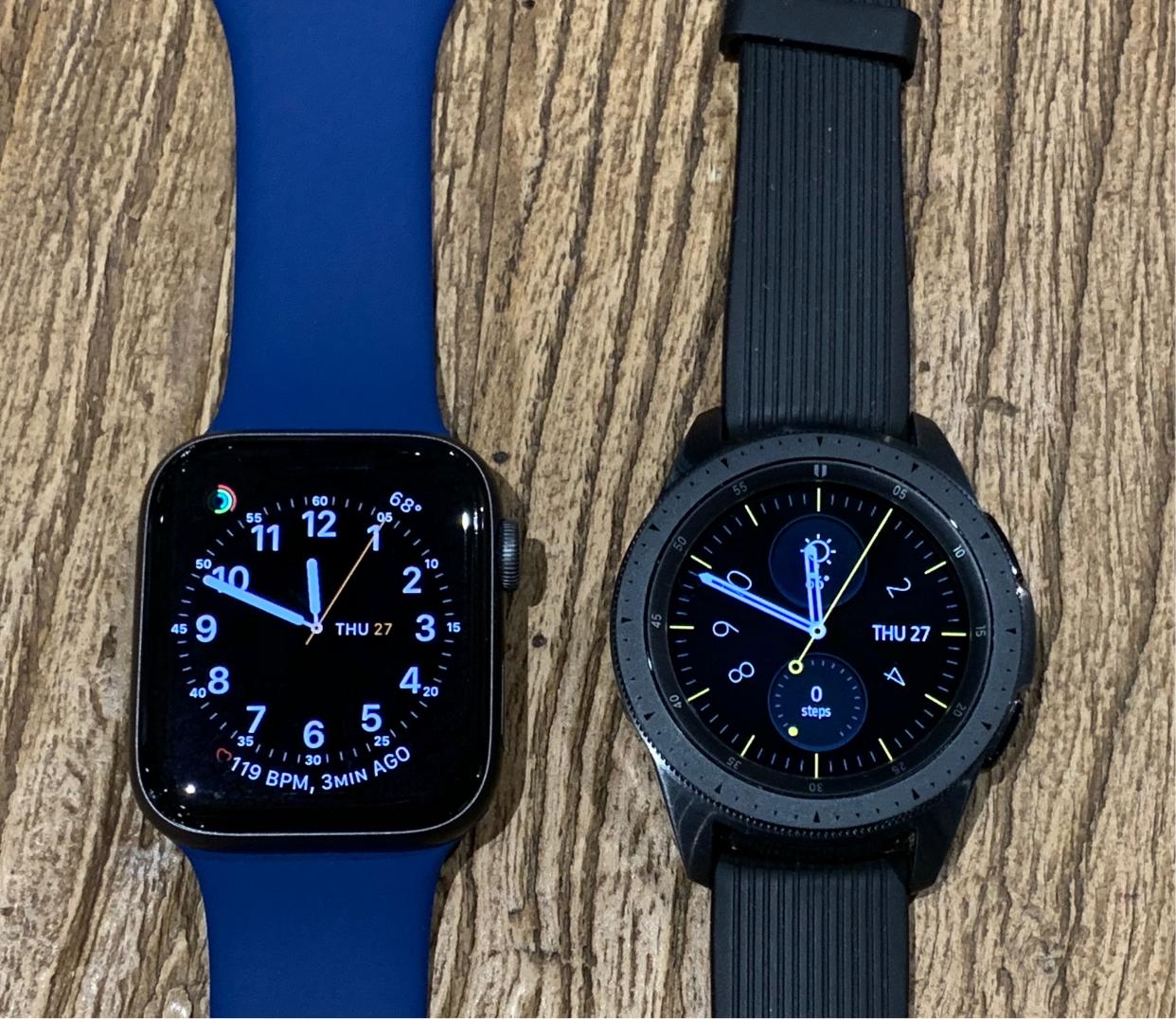 The Galaxy Watch next to the Apple Watch Series 4.