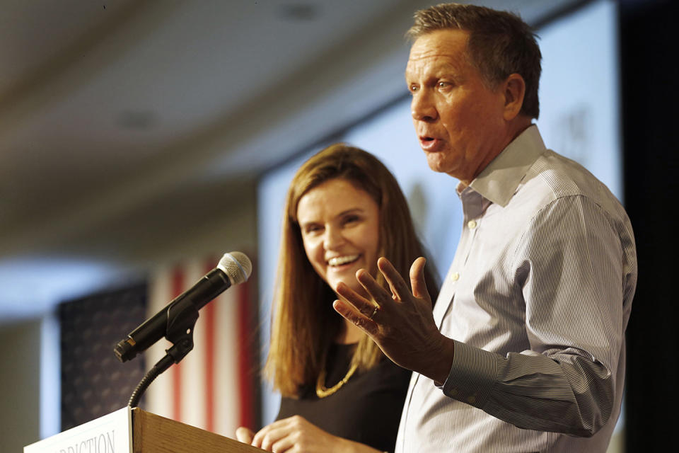 Republican presidential candidate, Ohio Gov. John Kasich, accompanied by Jessica Nickel, speaks during a stop at an Addiction Policy Forum, Tuesday, Jan. 5, 2016, in Hooksett, N.H. (AP Photo/Jim Cole)
