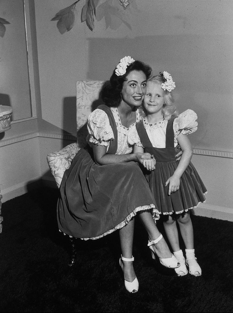 Joan Crawford with her adopted daughter Christina, whose memoir served as the basis for the film “Mommie Dearest.” Getty Images