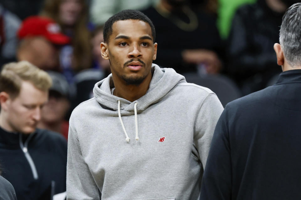 Atlanta Hawks guard Dejounte Murray (5) is seen on the bench during an NBA basketball game against the Toronto Raptors on Sunday, Jan. 28, 2024, in Atlanta. (Miguel Martinez/Atlanta Journal-Constitution via AP)