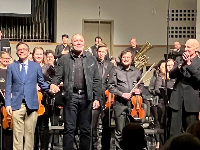 Composer Michael Abels (center) with Jose Francisco Salgado (left), who made a film to accompany the piece “Liquify,” commissioned by the QC Symphony Orchestra, and conductor Mark Russell Smith (right). The QCSO presented the work and film Sunday, Feb. 4, 2024 at Centennial Hall, Rock Island (photo by Jonathan Turner).