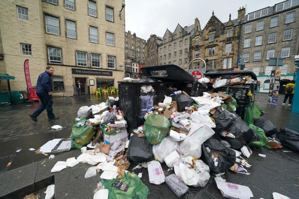 The strikes resulted in bins overflowing (Andrew Milligan/PA) (PA Wire)