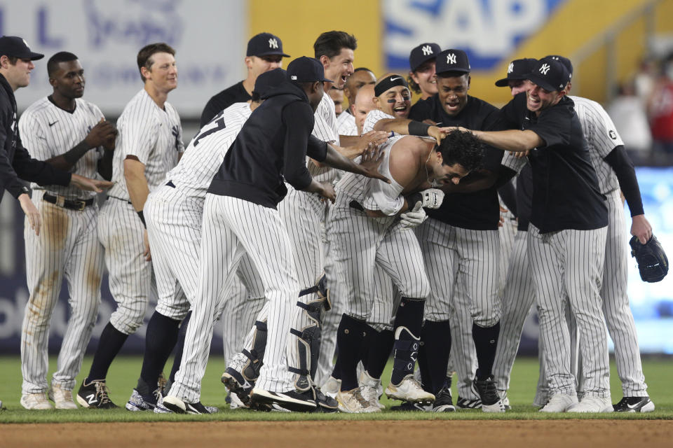 紐約洋基團隊慶祝贏球。（Photo by Rob Tringali/MLB Photos via Getty Images）