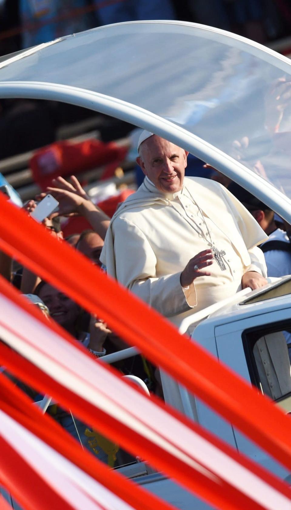 Pope Francis © arrives with popemobile to the Campus Misericordiae in Brzegi, Poland, 30 July 2016, for the evening vigil with pilgrims participating in the World Youth Day 2016. (EPA/JACEK TURCZYK POLAND OUT)