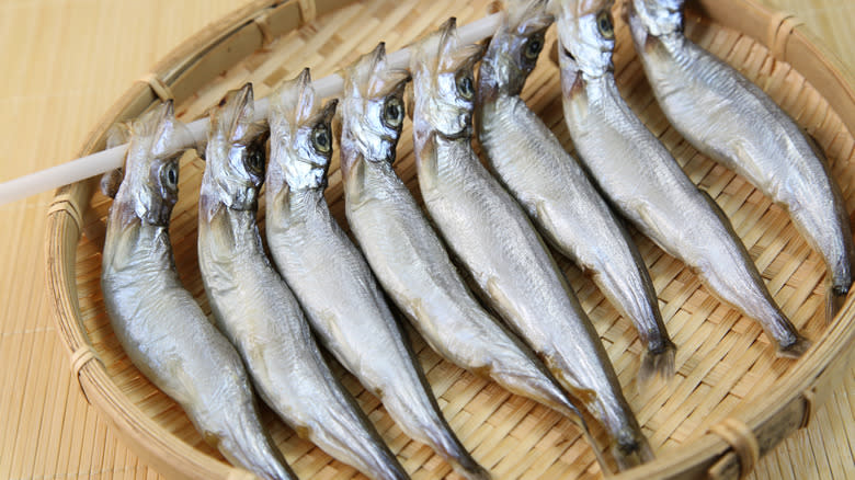 capelin skewered on a stick