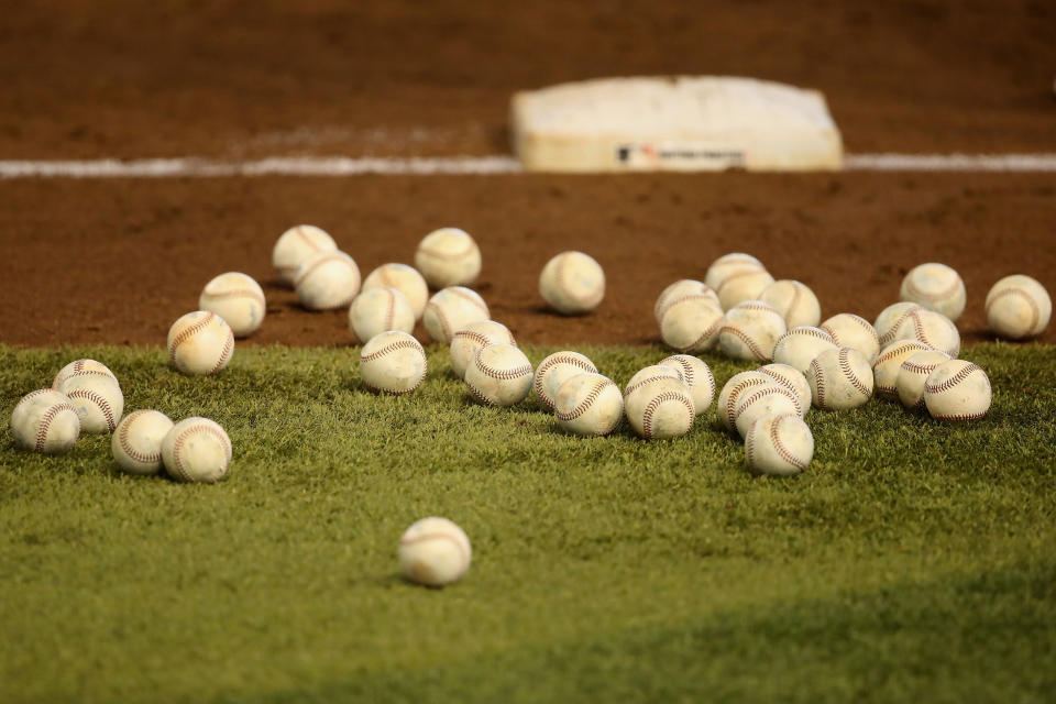 PHOENIX, ARIZONA - JULY 03: Detail of baseballs on the field as the Arizona Diamondbacks participate in summer workouts ahead of the abbreviated MLB season at Chase Field on July 03, 2020 in Phoenix, Arizona.  The 2020 season, which has been postponed since March due to the COVID-19 pandemic, is set to start later this month. (Photo by Christian Petersen/Getty Images)