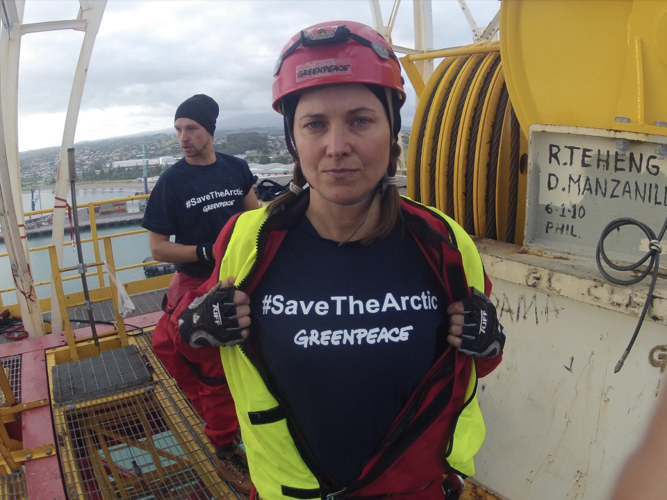 Lucy Lawless showing her "SavetheArctic" shirt
