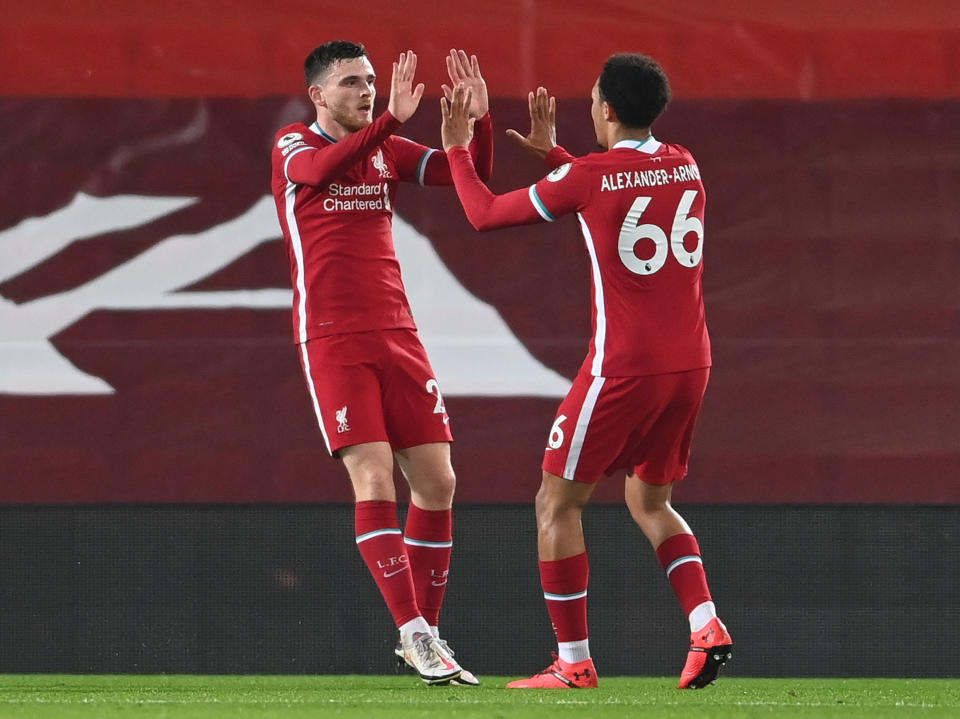 Andrew Robertson celebrates with fellow full-back Trent Alexander-ArnoldEPA