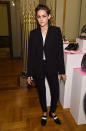 During fashion week in New York in January, Kristen Stewart wisely covered up. Her Stella McCartney suit, paired with faux patent leather loafers with a stacked heel and white stripe, wonderfully exuded Stewart's androgynous persona.