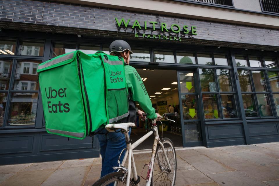 UberEats already delivers for a number of supermarkets (PA)