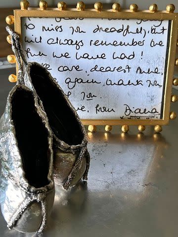 <p>courtesy anne allan</p> Letters and miniature ballet shoes given to Anne Allan by Princess Diana