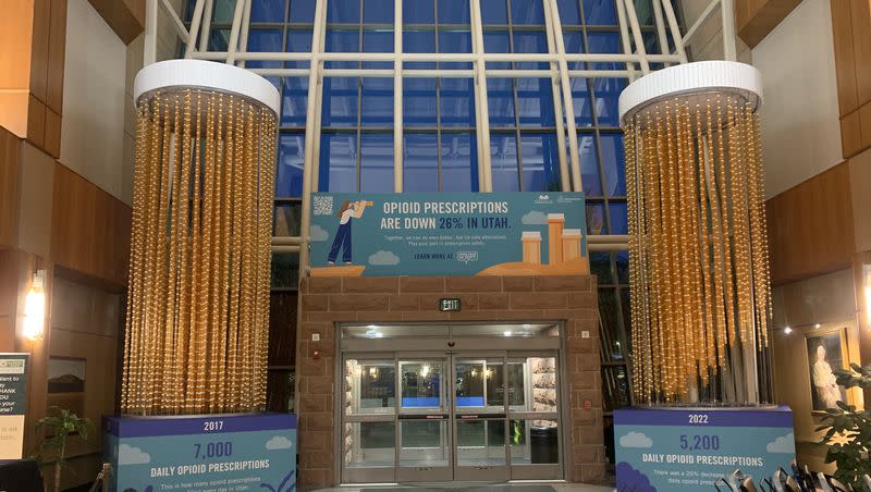 A pair of 20-foot high chandeliers made of pill bottles are displayed to represent a 26% reduction in daily opioid prescriptions in Utah at McKay-Dee Hospital in Ogden.