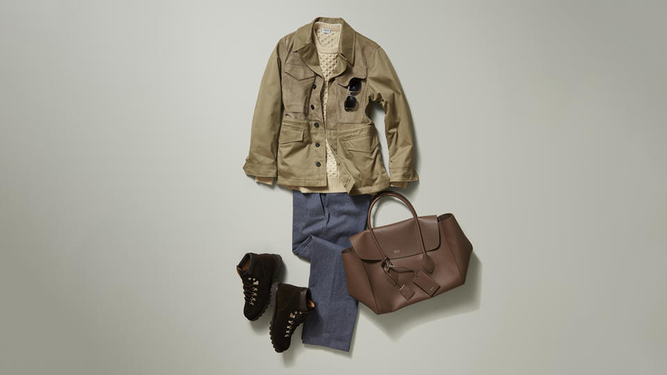 Berluti cotton and leather jacket, $5,300; Ghiaia Cashmere wool cable-knit sweater, $895; Stòffa upcycled cotton-twill pants, $475; Morjas suede hiking boots with Goodyear-welted rubber soles, $479; Akoni sunglasses in titanium and acetate, $1,115; Ferragamo leather tote bag, $2,500.