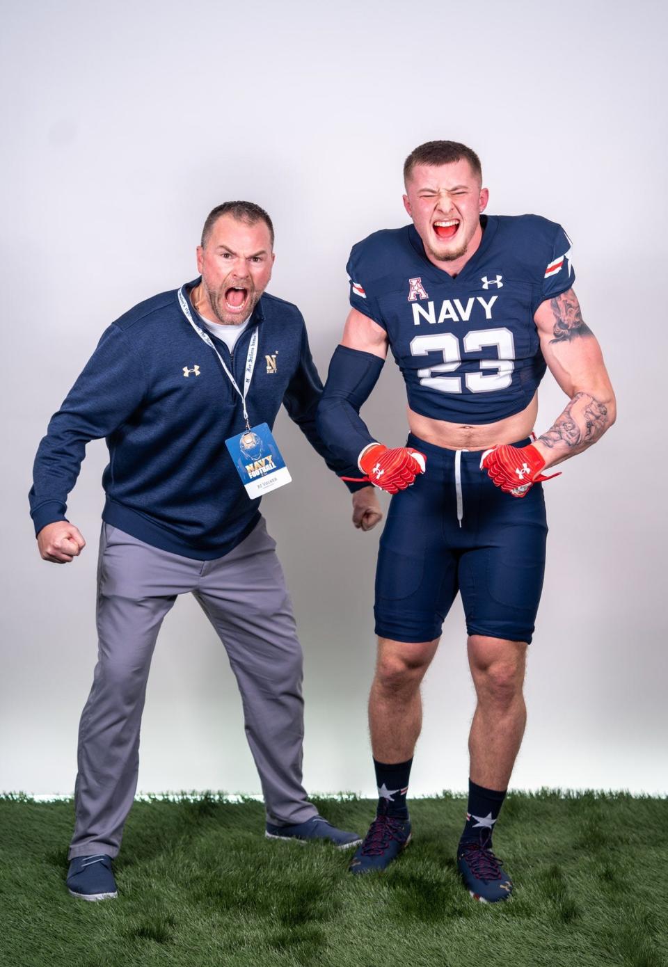 Ashland's Kadin Schmitz poses with Navy Linebackers coach PJ Volker during a recruiting visit.