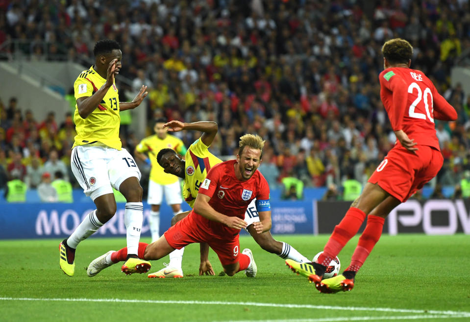 <p>Harry Kane of England is fouled by Jefferson Lerma of Colombia outside Colombia penalty area during the 2018 FIFA World Cup Russia Round of 16 match between Colombia and England at Spartak Stadium on July 3, 2018 in Moscow, Russia. (Photo by David Ramos – FIFA/FIFA via Getty Images) </p>