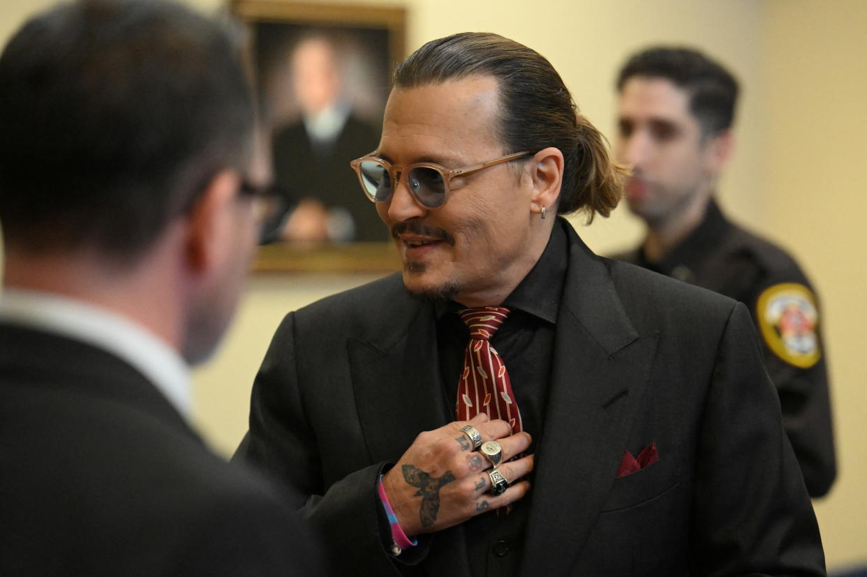 Johnny Depp arrives in the courtroom on May 3, 2022 at Fairfax County Circuit Court during his defamation case against ex-wife, actor Amber Heard
