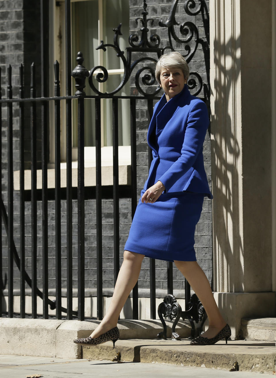 Britain's Prime Minister Theresa May prepares to face the media as she leaves 10 Downing Street, to visit Queen Elizabeth II where she will officially resign as Prime Minister, in London, Wednesday, July 24, 2019. Boris Johnson will replace May as Prime Minister later Wednesday. (AP Photo/Tim Ireland)