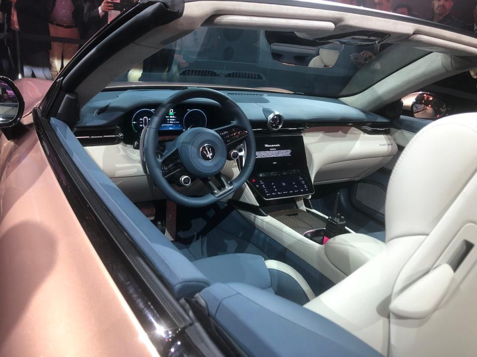 The interior is snug and practical, and two touchscreens are provided for the driver (Maserati)