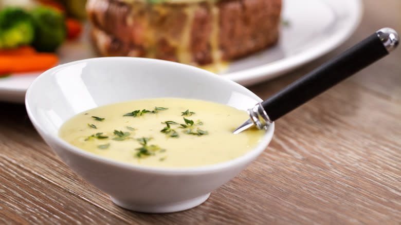 Bearnaise sauce in white bowl