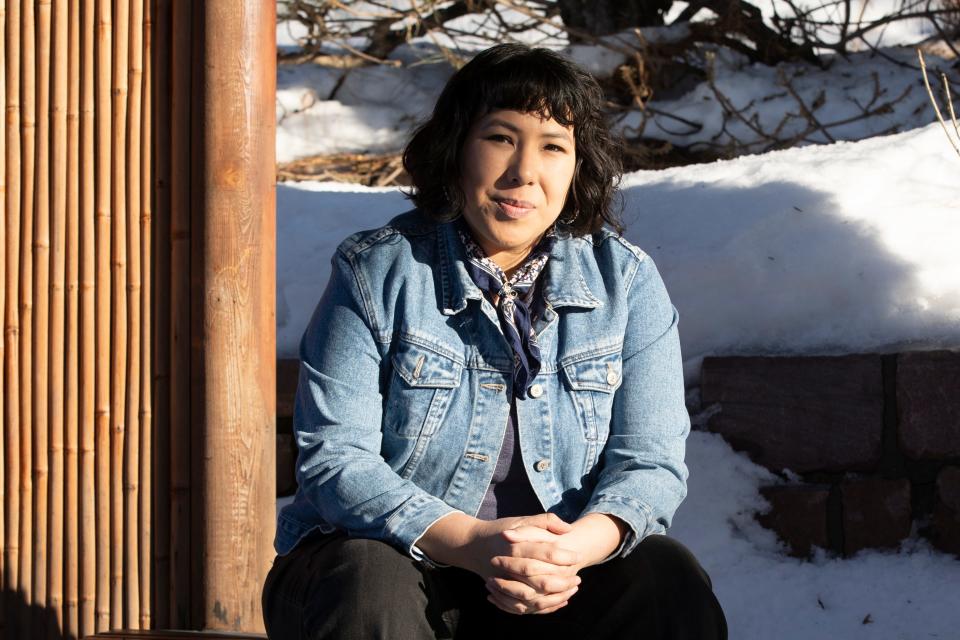 April Matson sits for a portrait in Sioux Falls, S.D., on Wednesday, Feb. 8, 2023. A few months after South Dakota banned abortion in 2022, Matson drove more than nine hours to take a friend to a Colorado clinic to get the procedure. The trip brought back difficult memories of Matson’s own abortion at the same clinic in 2016. The former grocery store worker and parent of two couldn’t afford a hotel and slept in a tent near a horse pasture — bleeding and in pain.