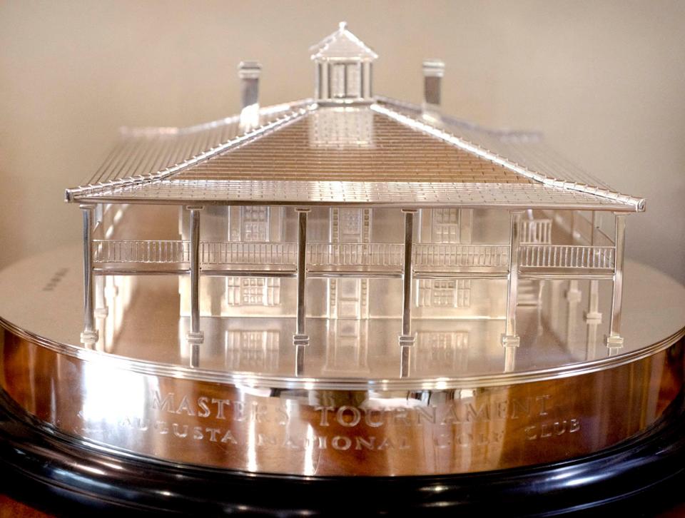 An early prototype by Garrard's of London of a detailed scale-model silver trophy of the Augusta National Clubhouse. The 28-pound trophy is available at the Old Golf Shop.