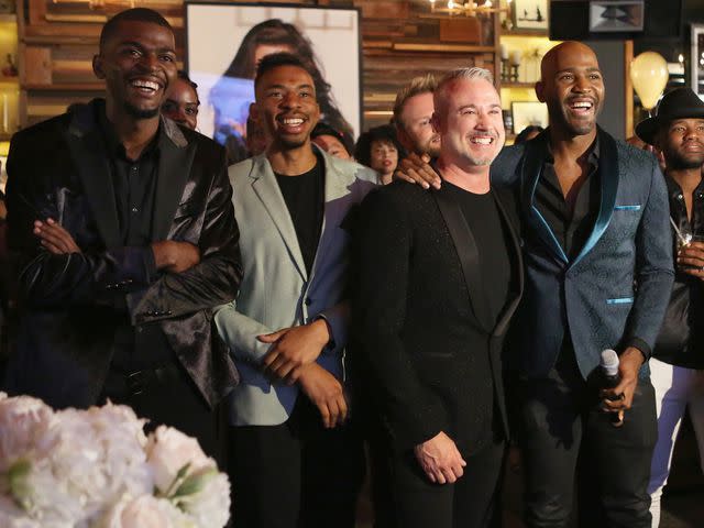 <p>Tasia Wells/Getty</p> Karamo Brown with his then-fiance Ian Jordan and his sons Jason "Rachel" Brown and Christian Brown, at Karamo Brown's engagement party on May 9, 2018 in West Hollywood, California