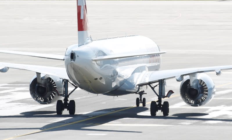 FILE PHOTO: Airbus A220 jet of Swiss Airlines is seen at Zurich airport in Zurich