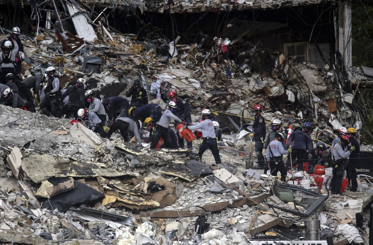 Search and rescue teams look for survivors at the Champlain Towers South residential condo on Tuesday, June 29, 2021, in Surfside, Fla. Many people were still unaccounted for after Thursday's fatal collapse.