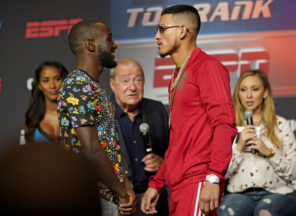 Jose Benavidez Jr., right, and Terence “Bud” Crawford had a brief scuffle during their weigh-in on Friday afternoon ahead of Saturday’s title fight in Omaha, Nebraska. (AP)