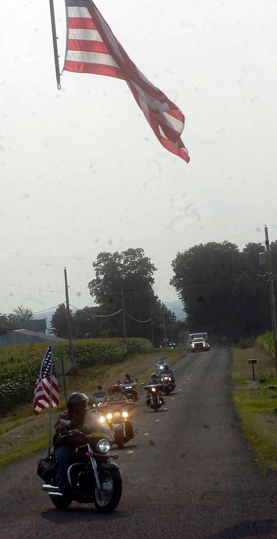 The American Veterans Travelling Tribute Vietnam Wall arrived at the Ashland County Airport Wednesday escorted by a caravan of 116 vehicles.