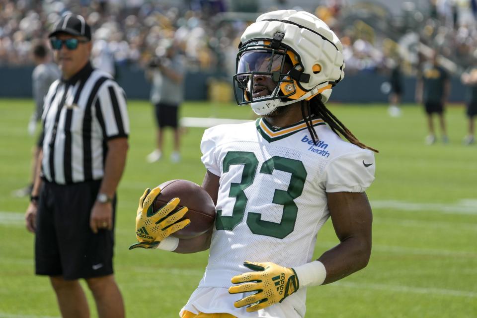 Green Bay Packers' Aaron Jones runs during NFL football training camp Thursday, July 27, 2023, in Green Bay, Wis. (AP Photo/Morry Gash)