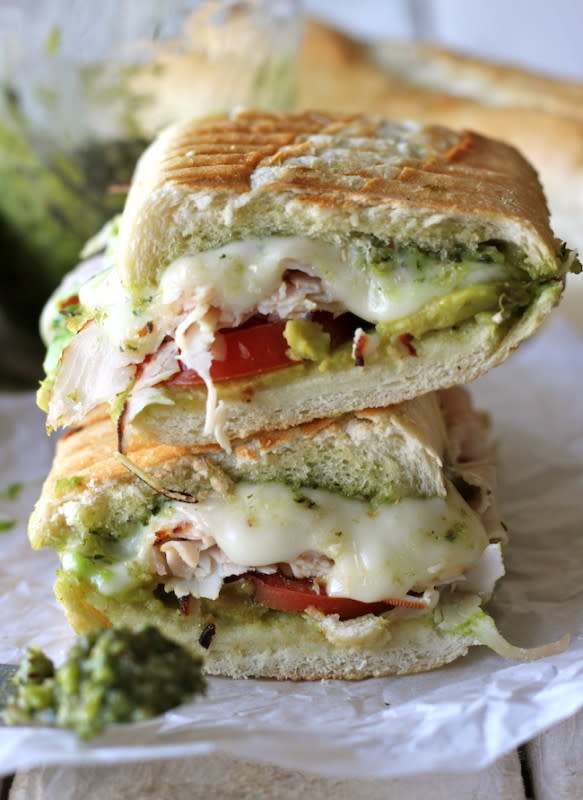 <p>Damn Delicious</p><p>This loaded panini is one of the perfect ways to use up your leftover Thanksgiving turkey! </p><p><strong>Get the recipe: <a href="https://damndelicious.net/2012/11/21/leftover-thanksgiving-turkey-pesto-panini/" rel="nofollow noopener" target="_blank" data-ylk="slk:Leftover Thanksgiving Turkey Pesto Panini;elm:context_link;itc:0;sec:content-canvas" class="link rapid-noclick-resp">Leftover Thanksgiving Turkey Pesto Panini</a></strong></p>