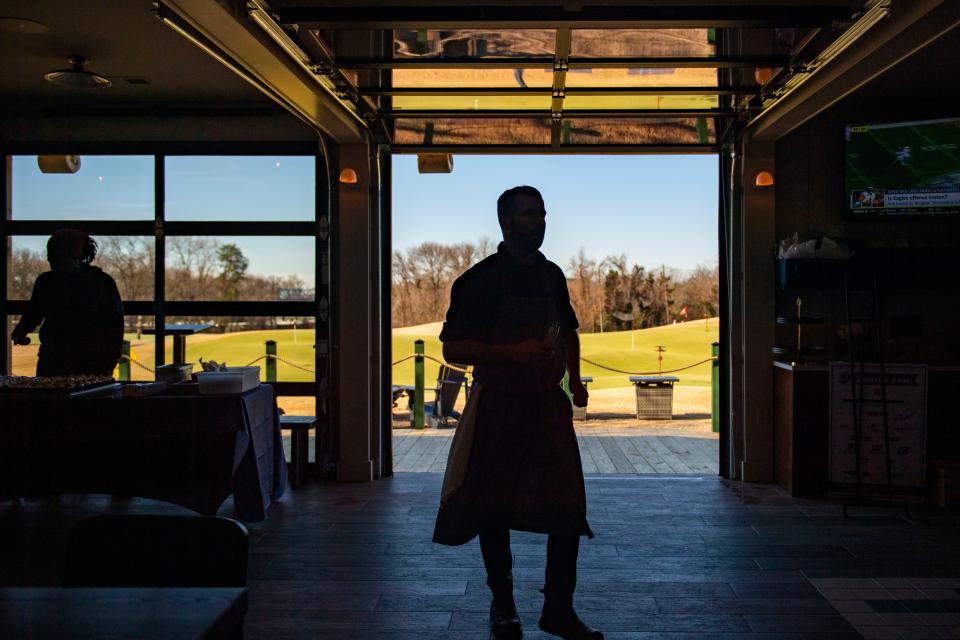 Chris Wehking, chef at The Grubhouse at 3's Greenville Golf, prepares for a grand opening event at the restaurant on Wednesday, Jan. 10, 2024.