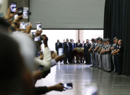 The coffin of late boxing champion Muhammad Ali arrives for a jenazah, an Islamic funeral prayer, in Louisville, Kentucky, June 9, 2016. REUTERS/Lucas Jackson