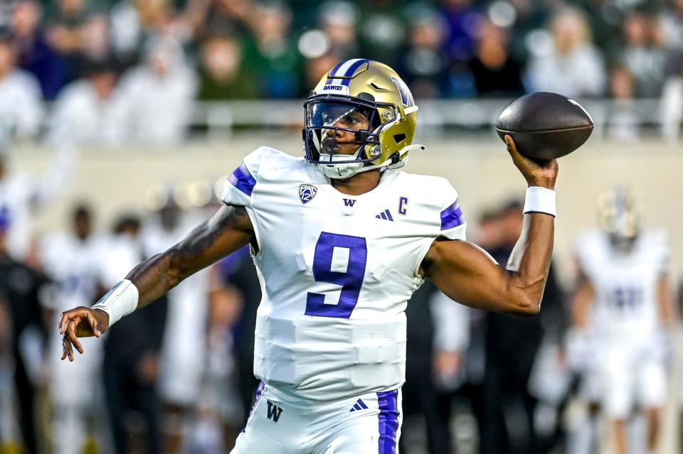 Washington quarterback Michael Penix Jr. throws a pass against Michigan State during the third quarter on Saturday, Sept. 16, 2023, at Spartan Stadium in East Lansing.