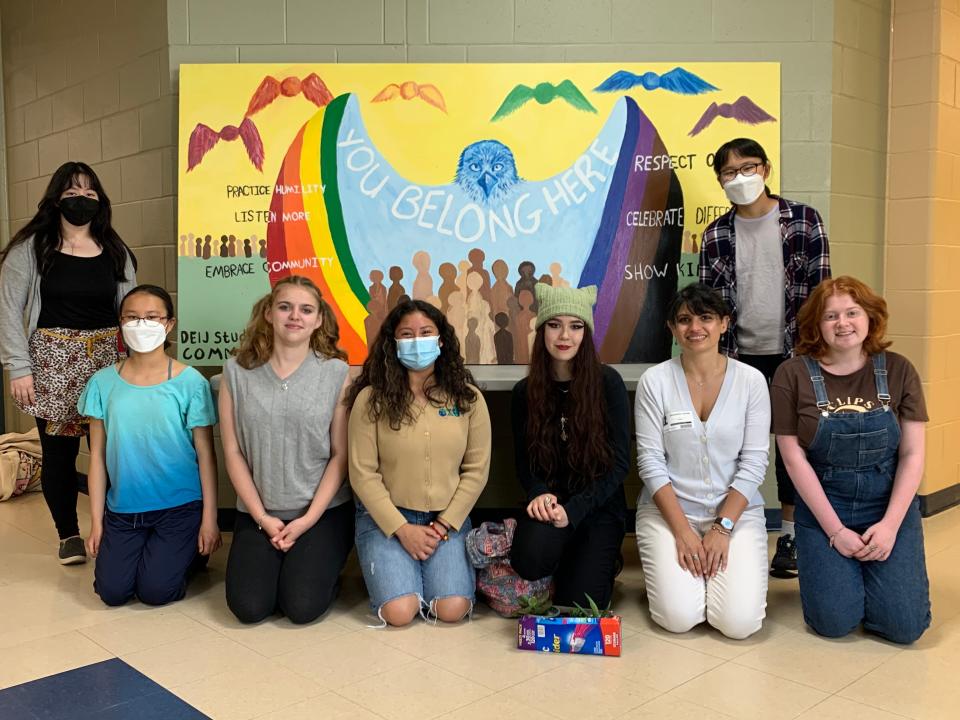 Hana Cass, left, Olivia Hwang, Dakota Jones, Beatriz Mella, Reilly Sanders, Sherry Hakimi (from genEquality), Grace Hwang, Morgan Peterson with the mural at Exeter High School. Additional students who participated, but are not pictured, are Samantha Saragih, Ellie Trabelsi, Sarah McManus and Alliana Rose.