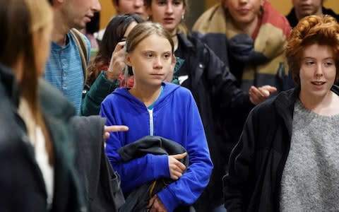 Thunberg leaves after a meeting at Complutense University, as the COP25 climate summit is held in Madrid - Credit: Reuters