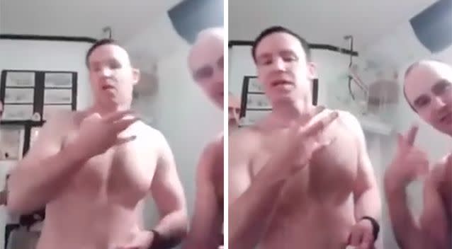 John 'Boy' Ward was seen on the left of the video making hand symbols with his shirtless fellow inmate. Photo: YouTube/John Traveller