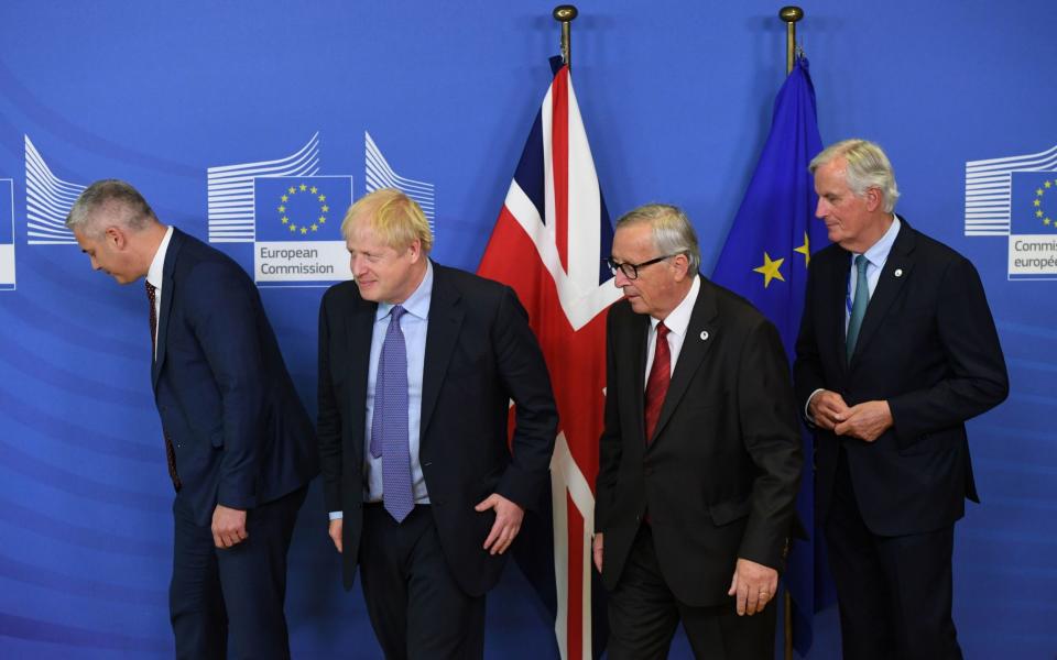 Brexit Secretary Stephen Barclay, Prime Minister Boris Johnson, Jean-Claude Juncker, President of the European Commission, and Michel Barnier, the EU's Chief Brexit Negotiator, ahead of the opening sessions of the European Council summit at EU headquarters in Brussels. PA Photo. Picture date: Thursday October 17, 2019. See PA story POLITICS Brexit. Photo credit should read: Stefan Rousseau/PA Wire Image title: POLITICS Brexit 14122619 - Stefan Rousseau/PA