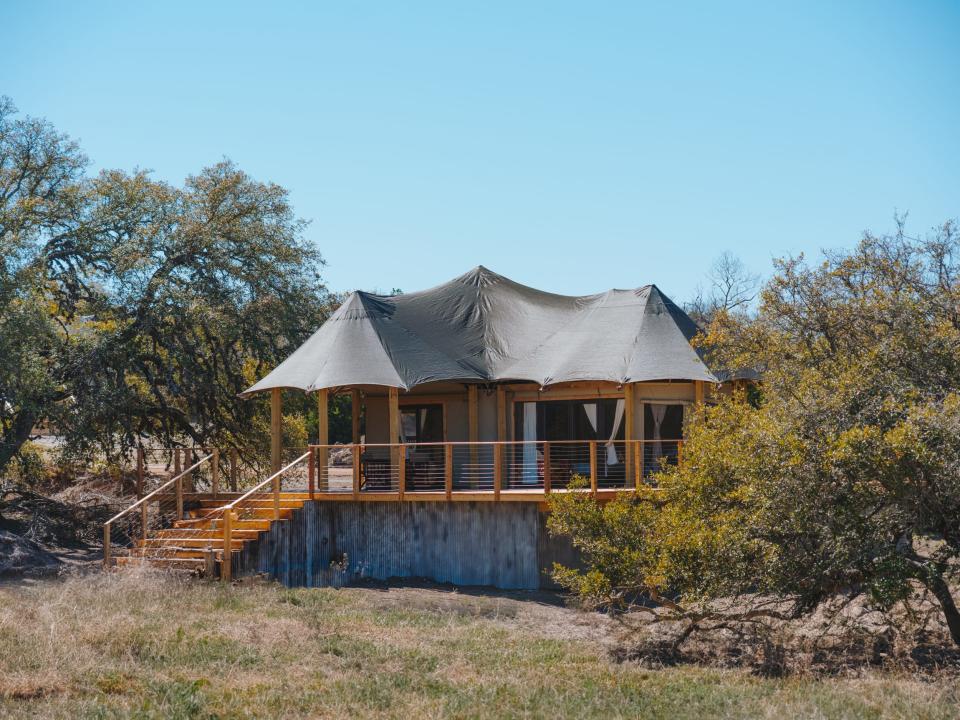 glamping tent outside at Outdoorsy Hill Country