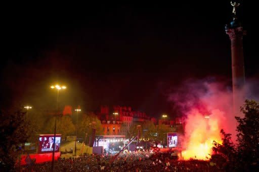 Socialist Party (PS) candidate for the 2012 French presidential election Francois Hollande addresses supoorters at the Bastille Square in Paris after the announcement of the results of the French presidential final round