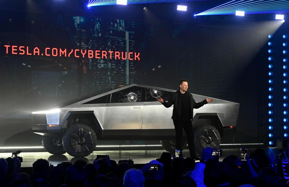 FILE PHOTO: Nov 21, 2019;  Hawthorne, CA, U.S.A; Tesla CEO Elon Musk unveils the Cybertruck at the TeslaDesign Studio in Hawthorne, Calif. The cracked window glass occurred during a demonstration on the strength of the glass.  Mandatory Credit: Robert Hanashiro-USA TODAY