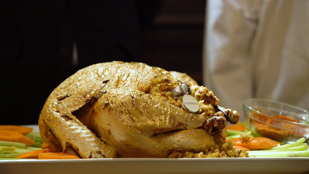 The Old Homestead $150,000 Thanksgiving dinner features options for gold turkeys: one sprinkled with gold flakes, or edible gold paint like this one stuffed with keys to a Maserati.
