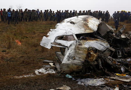 A cockpit of a crashed US-Bangla airplane lies on the crash site at the Tribhuvan International Airport in Kathmandu, Nepal March 12, 2018. REUTERS/ Navesh Chitrakar