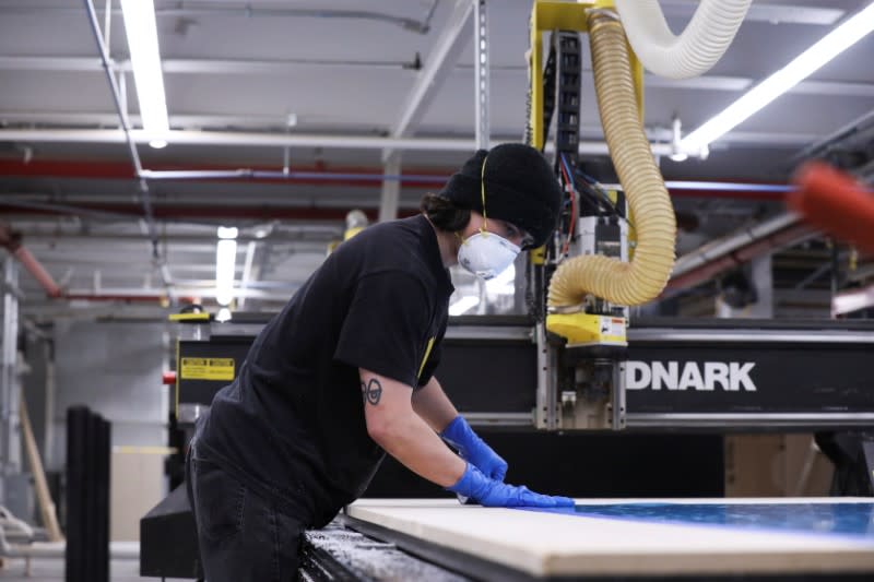 Workers at Bednark produce medical face shields, as the demand for their production rapidly increased