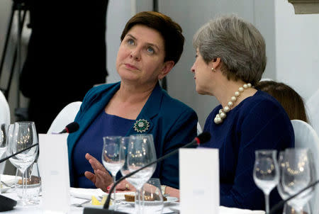 Britain's Prime Minister Theresa May talks to Poland's Prime Minister Beata Szydlo during a dinner in Tallinn ahead of an informal European Union leaders summit, Estonia September 28, 2017. REUTERS/Virginia Mayo/Pool