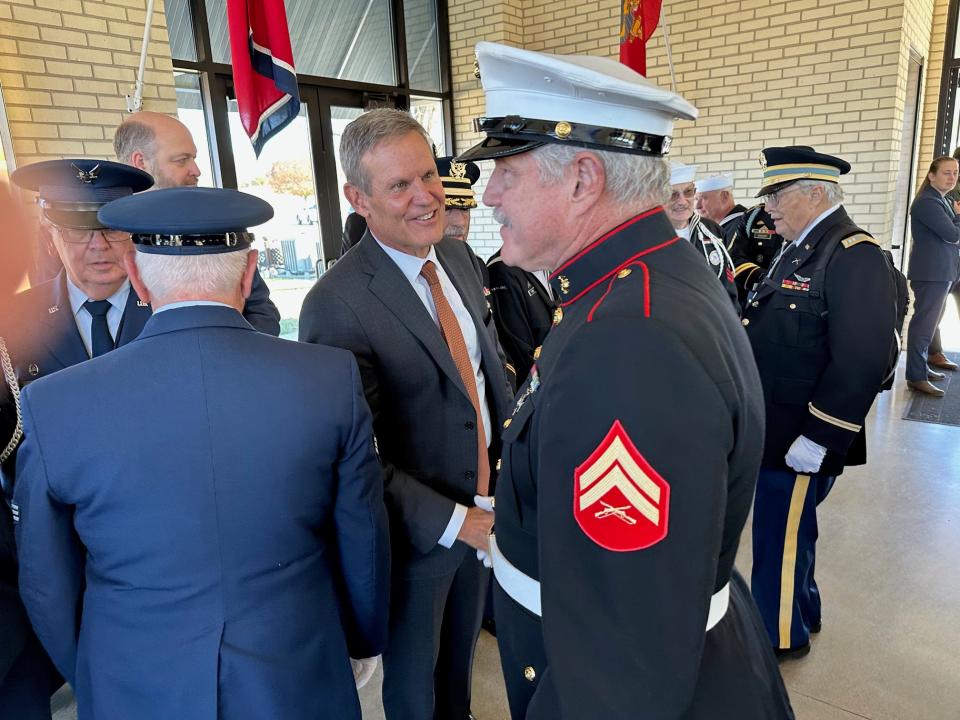 Gov. Bill Lee, center, greets members of the Tennessee Veterans Honor Guard at the East Tennessee Veterans Cemetery on John Sevier Highway, Nov. 29, 2023.
