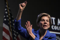 Democratic presidential candidate Sen. Elizabeth Warren, D-Mass., gestures during her address at the New Hampshire Institute of Politics in Manchester, N.H., Thursday, Dec. 12, 2019.(AP Photo/Charles Krupa)