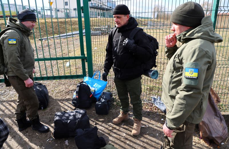 FILE PHOTO: Estonian citizens from Tallinn gather before crossing the border from Poland to Ukraine to join as foreign fighter at the front line in Ukraine following Russia's invasion, at the border checkpoint in Medyka